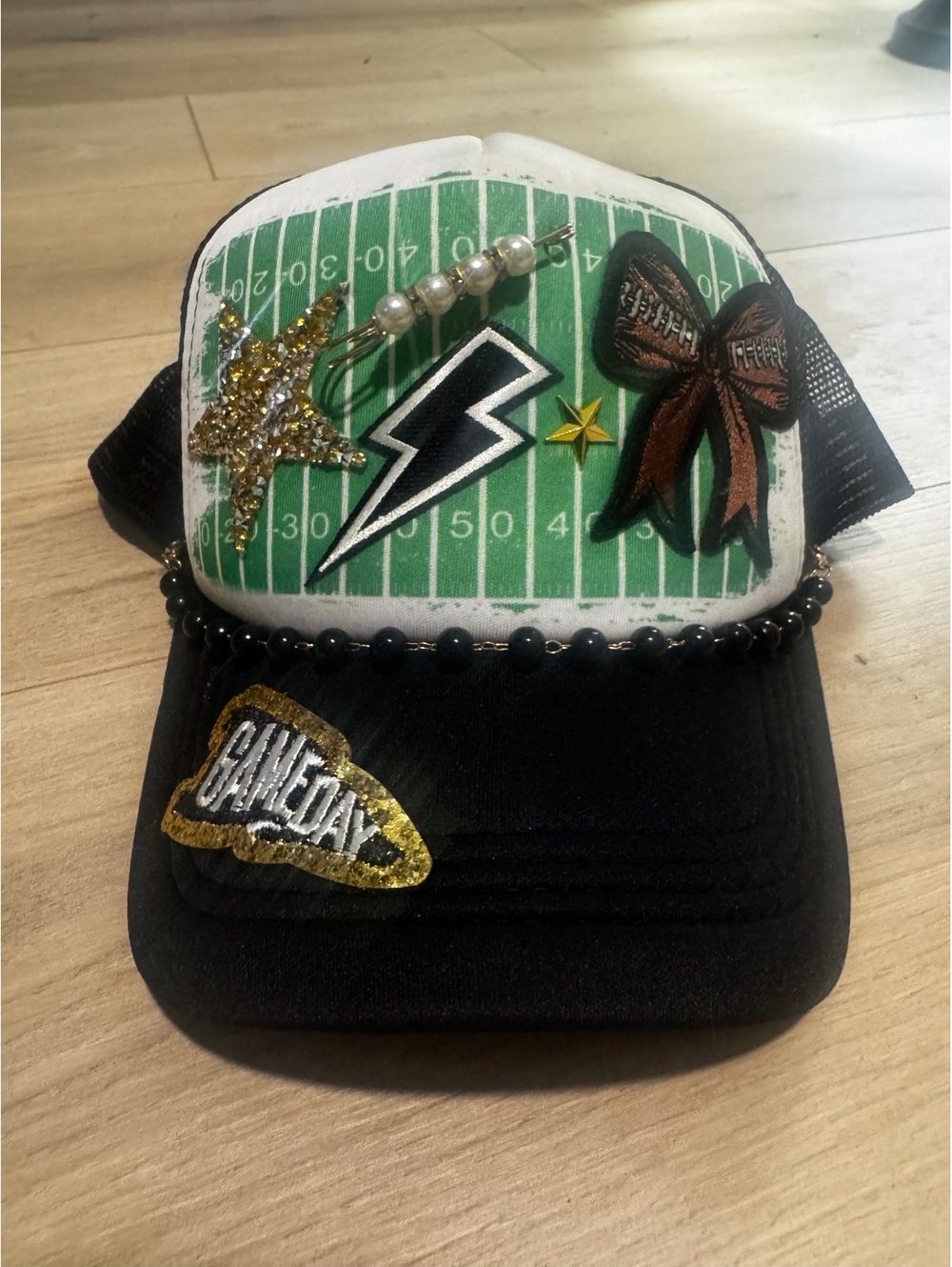 Black Mesh Baseball Cap with Football Field Design and Decorative Patches